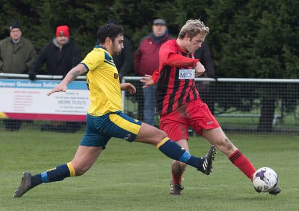 Fareham Town's Simon Woods and Curtis Da Costa of Moneyfields, left, were both on target in the derby. Picture: Keith Woodland (170082-0390)