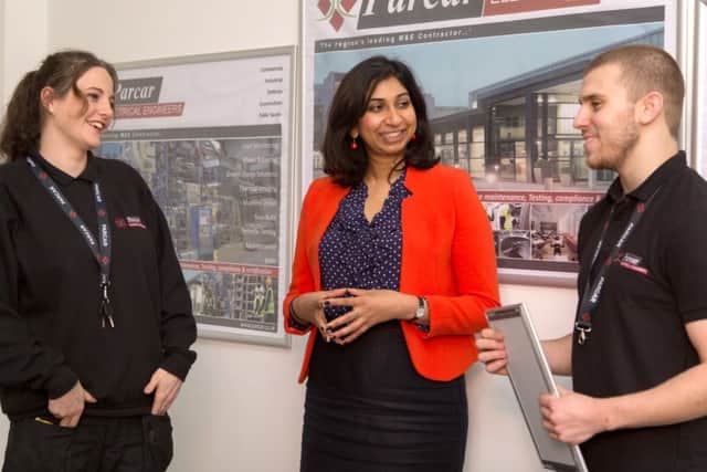 ParCar Engineering apprentices talk with MP Suella Fernandes. Pictured with Suella are Sarah Alexander, a 1st year electrical apprentice, and Scott Stephens, who is qualifying after completing his electrical apprenticeship