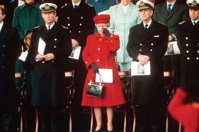 Tearful farewell: For once, the Queen cant hold back her emotions as she says goodbye to Britannia at South Railway Jetty, scene of so many Royal arrivals and departures. PPP-170116-140811001