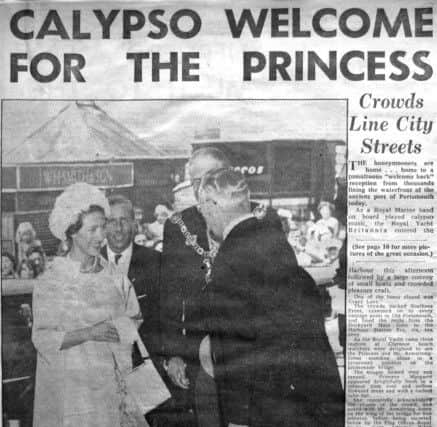 Last leg: The honeymooners arrive at Portsmouth Harbour Station where the Lord Mayor introduces the Princess to stationmaster Mr I F Gilmore. PPP-170116-140744001