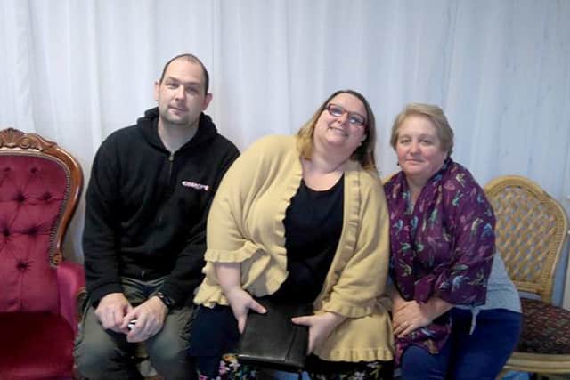 John Reilly with Charlie Reilly and Sharon Bannister, trustees of Square Pegs Charity