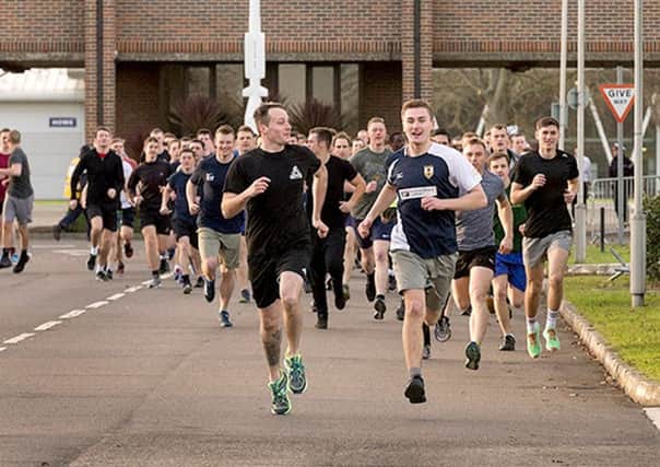 Runners compete along Royal Sovereign Avenue, HMS Collingwood