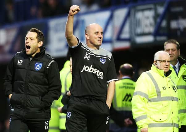Pompey boss Paul Cook will have plenty to celebrate at the end of the season if Jeff Marshman's predictions are anything to go by  Picture: Joe Pepler