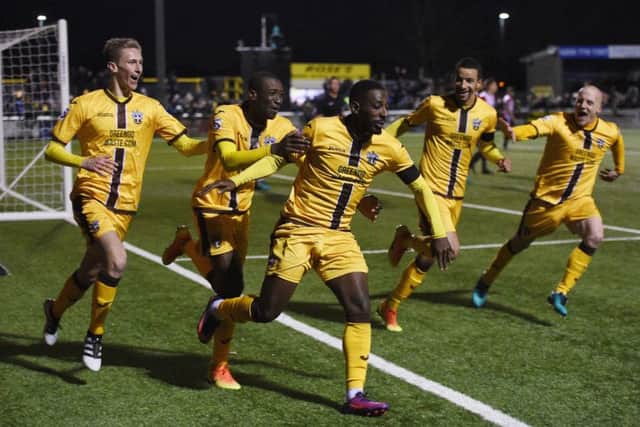 Pompey youngster Adam May, far left, was part of a famous FA Cup win for Sutton United tonight