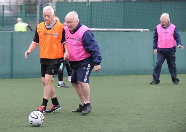 Members of the Pompey in the Community Walking Football Club in action