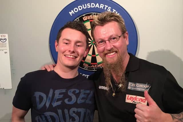Simon Whitlock, right, beat Mike Gillet, left, in the final