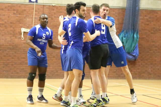 Alex Menya, lef, and Portsmouth City celebrate a point. Picture: Habibur Rahman