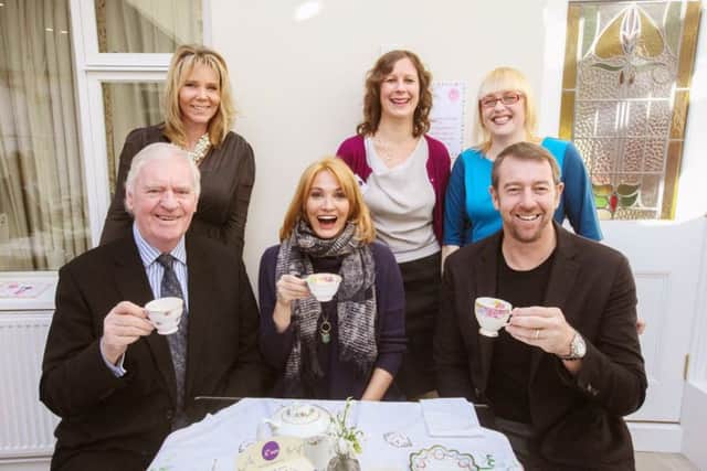 Back row, Heidi Rehman, Marian Parfitt and Sally Hillyear from Breast Cancer Haven staff with Lawrie McMenemy, actress Sarah Parish and footballer Paul Jones at last years Big Tea Cosy