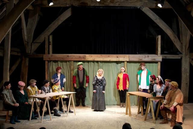 A performance in the Great Barn and, below, an outside view of the barn which will be hired out for corporate events to raise funds for its upkeep