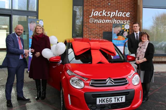 Darren Tait of Beals, lottery winner Katrina Bartram, Thomas Cullen from Richmond and Sarah Hudson, from Naomi House & Jacksplace.
