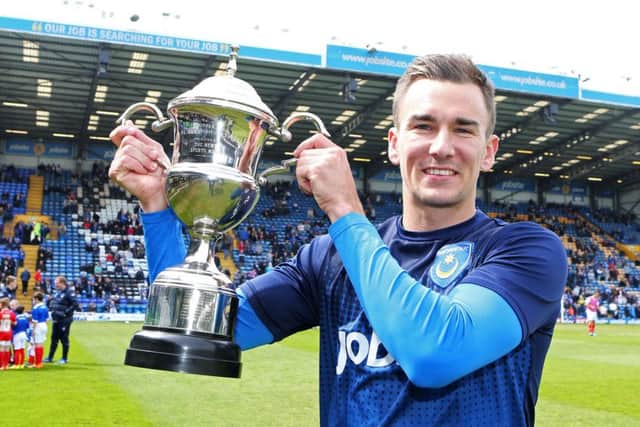 Former Pompey player Jed Wallace with the 2014-15 News/Sports Mail of the year trophy