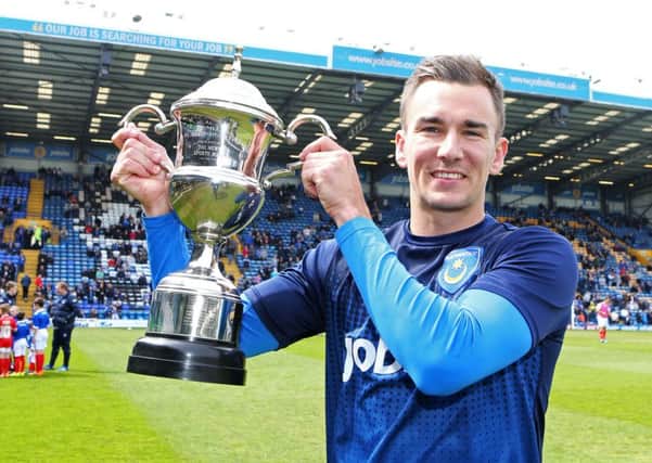 Former Pompey player Jed Wallace with the 2014-15 News/Sports Mail of the year trophy