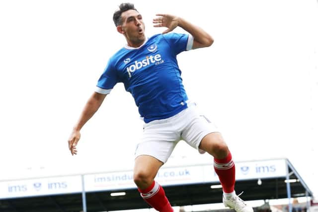 Gary Roberts celebrates his goal in Pompey's 3-0 win over Crawley earlier in the season Picture: Joe Pepler
