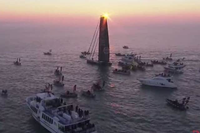 Alex Thomson crosses the finishing line