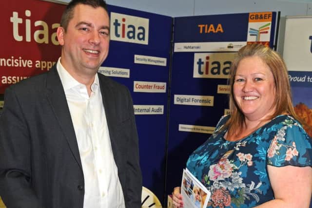 Last year's Gosport Business and Employment Fair - visitor Carl Garrod, who works in sales, talks to Louisa Bowers of business auditors TIAA Picture: Ian Hargreaves (160168-3)