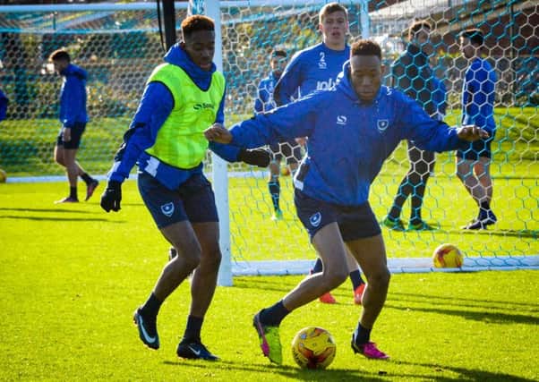 Jamal Lowe, left, and Nicke Kabamba in action during Pompey training Picture: Colin Farmery