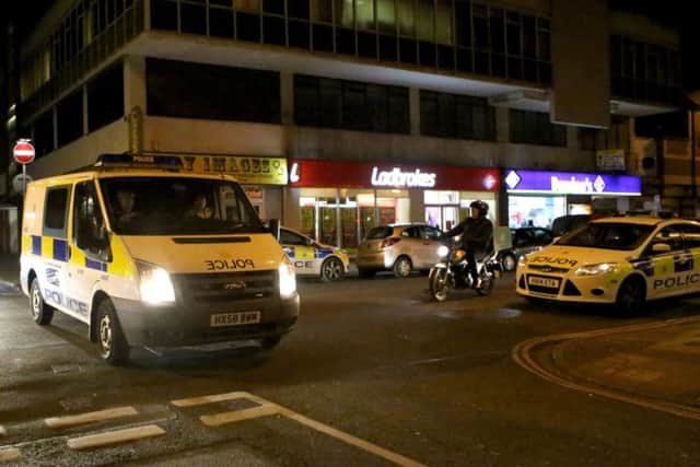 Police turn up to the Venture Tower as protestors thought to be from the far-right make an appearance Picture: Habibur Rahman