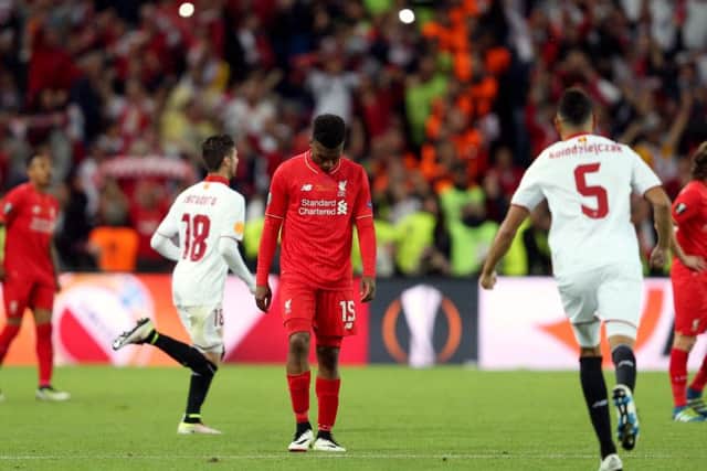 Daniel Sturridge cuts a disconsolate figure after Liverpools Europa League final defeat to Sevilla in May 2016