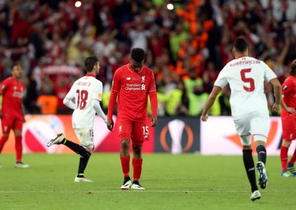 Daniel Sturridge cuts a disconsolate figure after Liverpools Europa League final defeat to Sevilla in May 2016