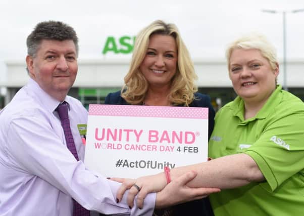 Chair of the Stormont All Party Group on Cancer Jo-Anne Dobson MLA, with Asda Portadown General Store Manager, Simon Arlow and Asda Portadown Community Champion, Elaine Livingstone.