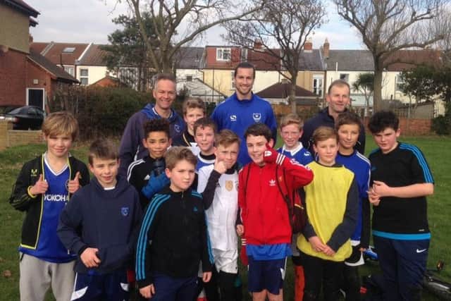Christian Burgess with the Skilful under-12 youngsters