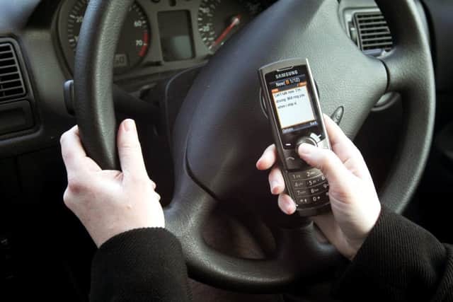 Police are launching a crackdown on mobile phone use at the wheel Picture posed by model