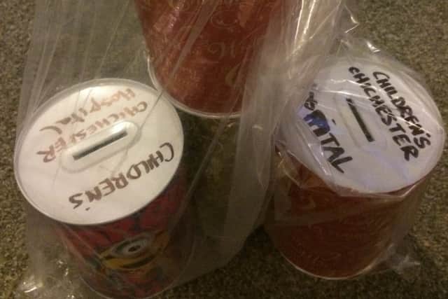 Collection tins seized by Trading Standards (photo submitted).