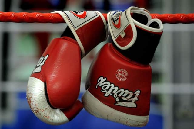 Clive is having a go at boxing