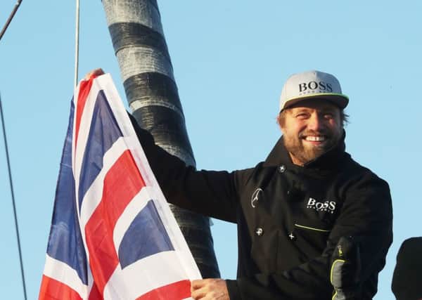 Alex Thomson onboard his Hugo Boss  yacht Picture: Lloyd Images