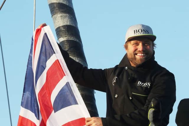 Alex Thomson onboard his Hugo Boss  yacht Picture: Lloyd Images