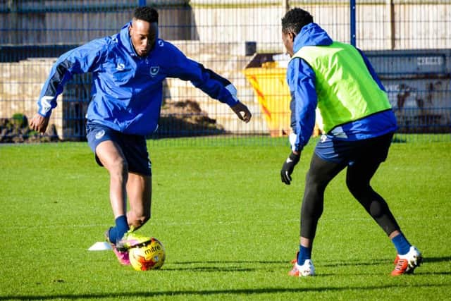 Nicke Kabamba, left, during a training session with Pompey Picture: Colin Farmery