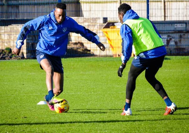Nicke Kabamba, left, during a training session with Pompey Picture: Colin Farmery