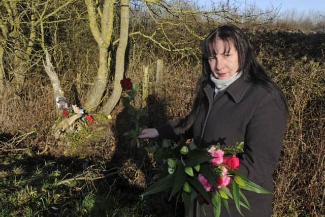 Sarah Hiscutt from Paulsgrove on the B2177 near Southwick where she has made a memorial to her son Luke who died a year ago. Picture: Ian Hargreaves (170056-1)
