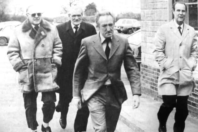 The chairman of the Pompey Ex-Professionals Club, Len Curtis, left, arriving at the funeral service for Cliff Parker. With him are other former players, Dougie Read, back, Peter Harris, front left, and Reg Flewin