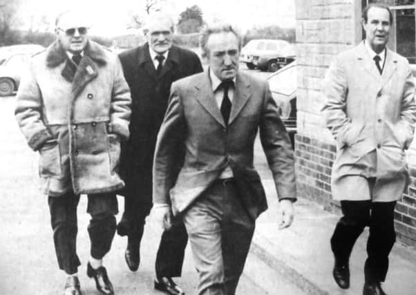 The chairman of the Pompey Ex-Professionals Club, Len Curtis, left, arriving at the funeral service for Cliff Parker. With him are other former players, Dougie Read, back, Peter Harris, front left, and Reg Flewin