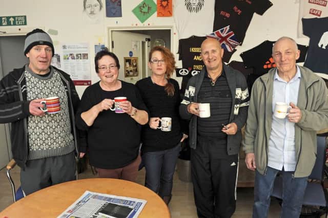 From left, Garrod Phillips, Jane Muir, Donna Carter, John Fraser and Mark Taylor of the Big Issue at the Recovery Cafe whi has been found a new base