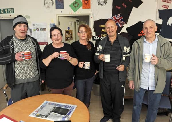 From left, Garrod Phillips, Jane Muir, Donna Carter, John Fraser and Mark Taylor of the Big Issue at the Recovery Cafe whi has been found a new base