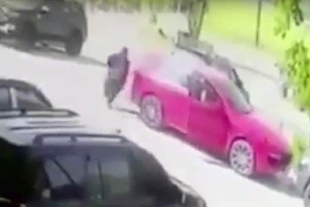 CCTV footage shows a male approaching the car and leaving