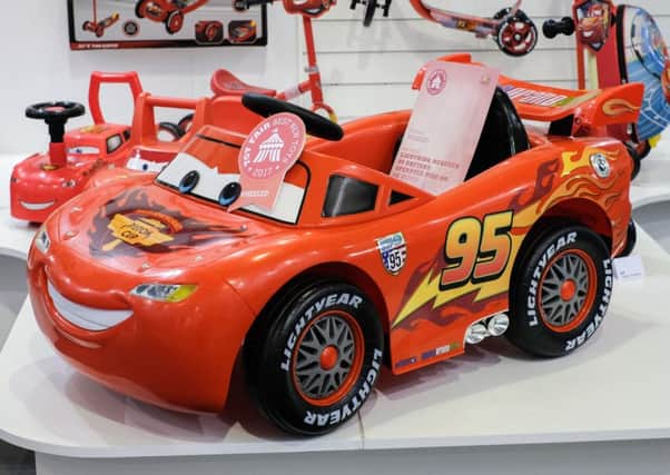 A ride-on replica of Cars' Lightning McQueen has been tipped as one of 2017's top toys
