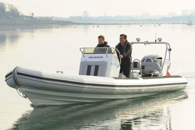 Tom Sanderson and Steve Rodwell come alongside with 'Sunna' at Trafalgar Wharf, Portchester. Picture: Malcolm Wells