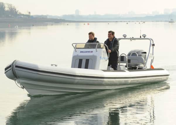 Tom Sanderson and Steve Rodwell come alongside with 'Sunna' at Trafalgar Wharf, Portchester. Picture: Malcolm Wells
