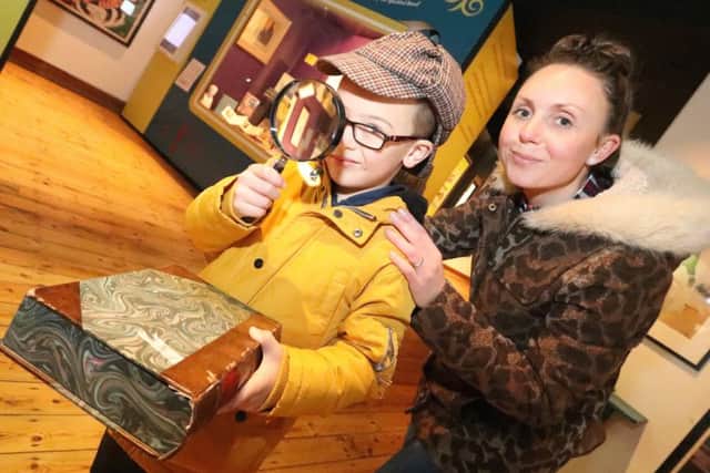 Ollie Dunning, six, and his mum Emma explore the world of Sherlock Holmes at the City Museum Picture: Habibur Rahman (170004-80)
