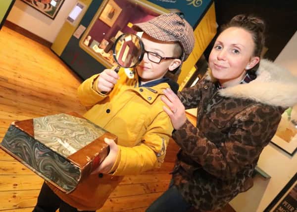 Ollie Dunning, six, and his mum Emma explore the world of Sherlock Holmes at the City Museum Picture: Habibur Rahman (170004-80)