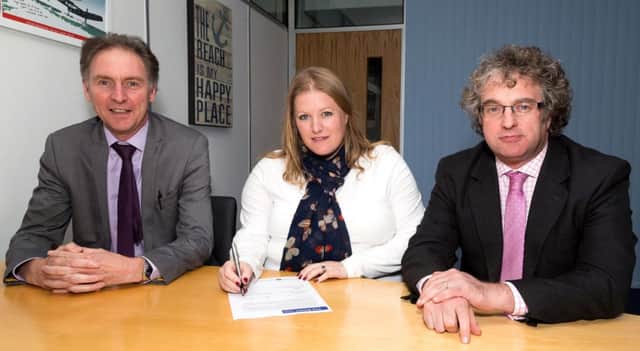 Southampton City Council leader Simon Letts, Portsmouth's leader Donna Jones and Councillor Jonathan Bacon, the former leader of Isle of Wight Council signing the application for the Solent Combined Authority last year