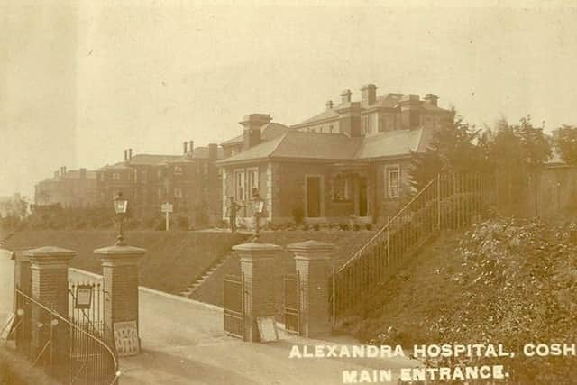 A soldier outside the former main entrance to Queen Alexandra Hospital, Cosham