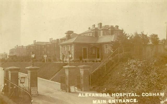 A soldier outside the former main entrance to Queen Alexandra Hospital, Cosham