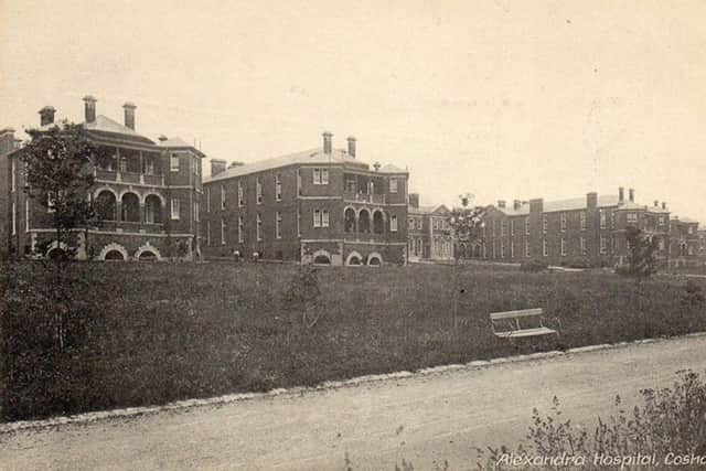 The grand façade of QA in the days when it was a military hospital