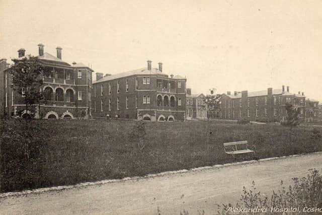 The grand faÃ§ade of QA in the days when it was a military hospital