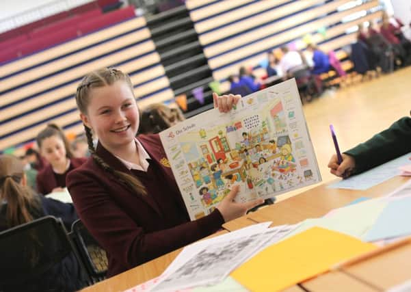 Luisa Campbell, 11, of Portsmouth High School, teaches German at the Festival of Languages