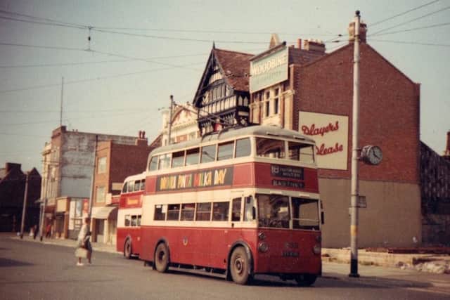 Trolleybus at the war-torn Hard, Portsea alongside the site of the former  Bedford in Chase pub